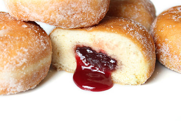 istock Image of fresh jam doughnuts / jelly donuts, with caster sugar 539167613