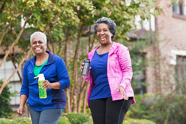 istock Two senior black women walking for exercise 539167681