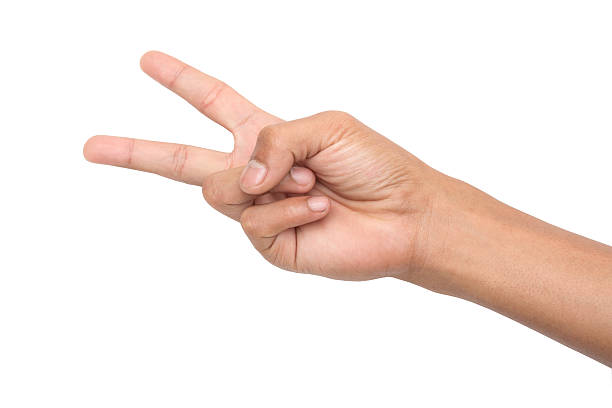 istock Hand forming victory sign isolated on white background 539181001