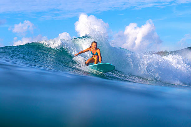 istock Surfer girl on Amazing Blue Wave 539182659