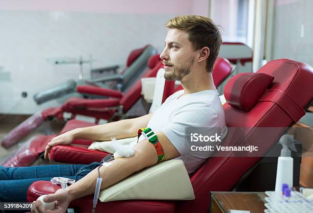 Man Giving Blood Donation Stock Photo - Download Image Now - Blood Donation, Men, Blood