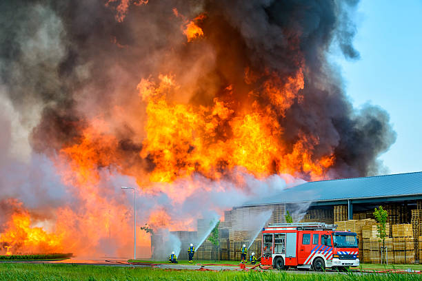 istock Fire fighters at an industrial inferno 539205411