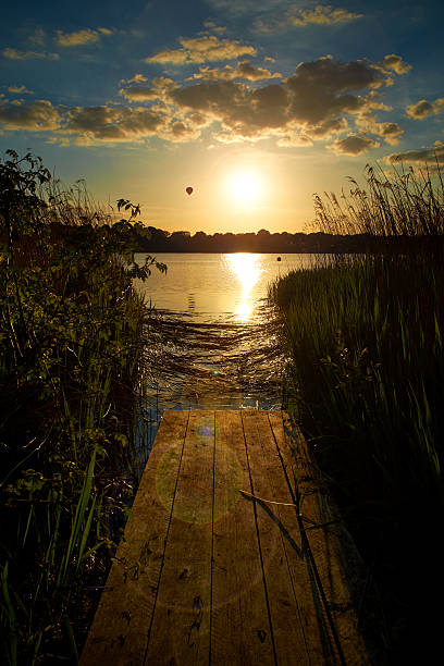 istock Hot Air Balloon Drifting Over Lake 539205577