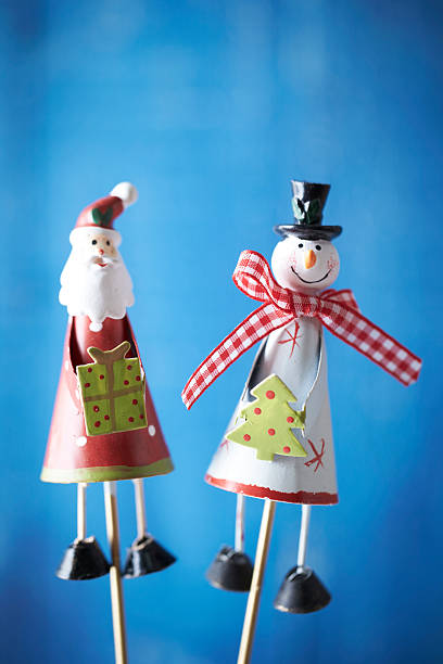 istock Santa claus and snowman doll 539206464