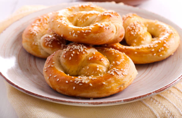 istock Soft pretzels with sesame seeds on plate 539206662