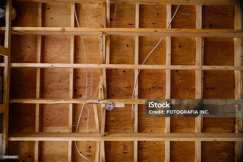 Residence renovation Ceiling Detail of Interior of Home during complete renovation. This old house was complete gutted inside and now new wooden framing is installed for next phase of modern walls, floor and ceiling. 2015 Stock Photo