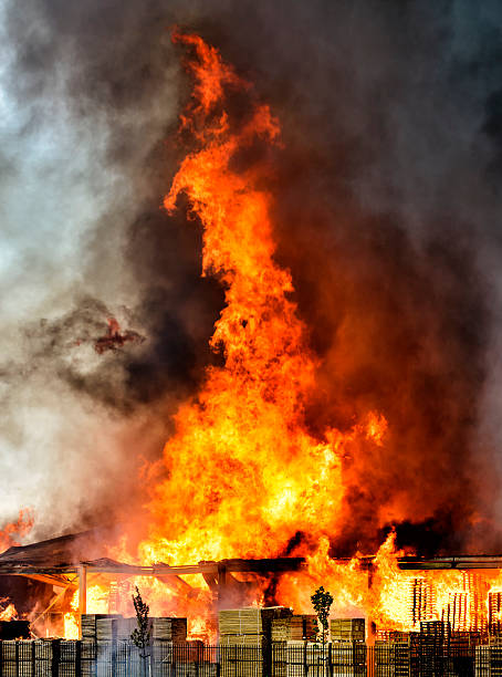 Pallet factory burning in industrial area
