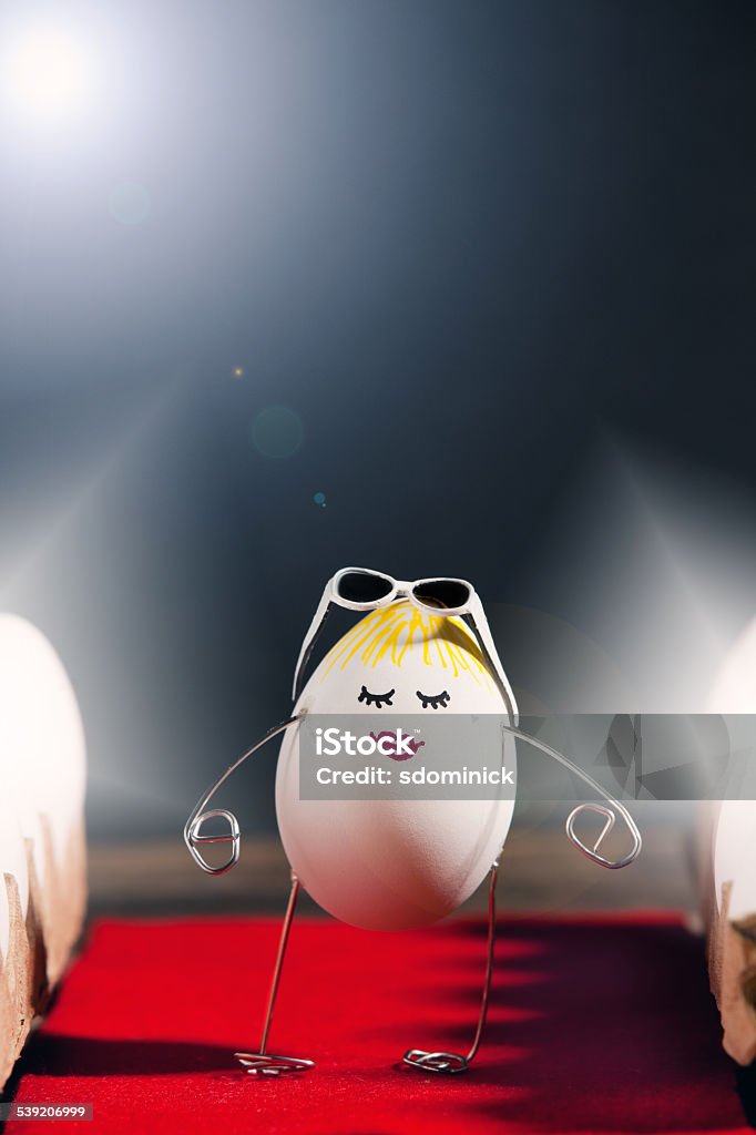 Famous Egg Walking The Red Carpet A personified egg walking the red carpet. Egg - Food Stock Photo