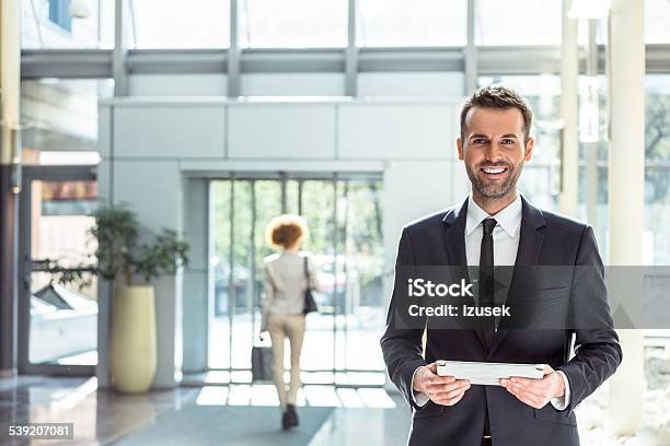Hotel Manager With A Digital Tablet Stock Photo - Download Image Now - Hotel, Manager, Leadership