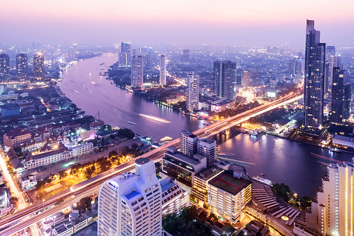 Aerial view of the Bangkok city skyline and the Chao Phraya River, Thailand.