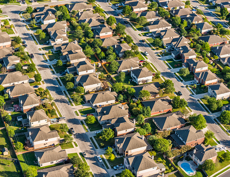 San AntonioTexas suburban housing development neighborhood - aerial view with houses in rows in middle-class neighborhood
