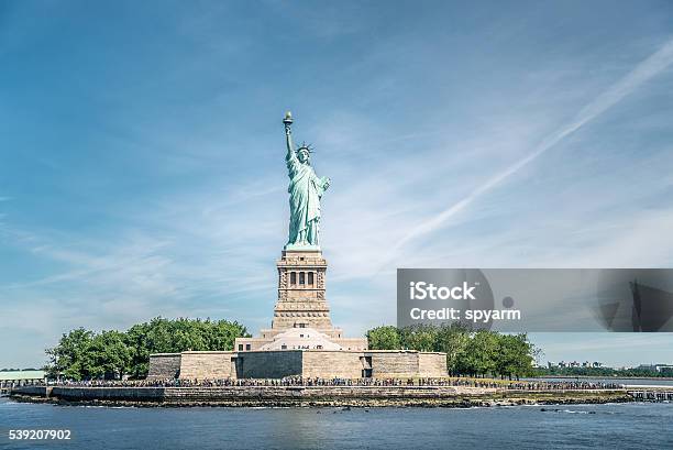 The Statue Of Liberty In New York City Stock Photo - Download Image Now - Freedom, Statue, Blue