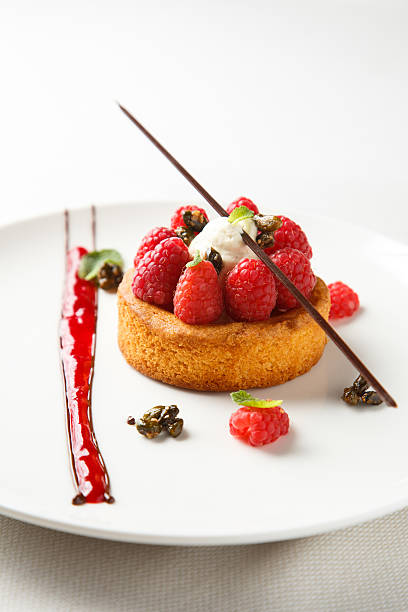 istock Sable breton or shortbread with vanilla cream and raspberry coulis 539208184
