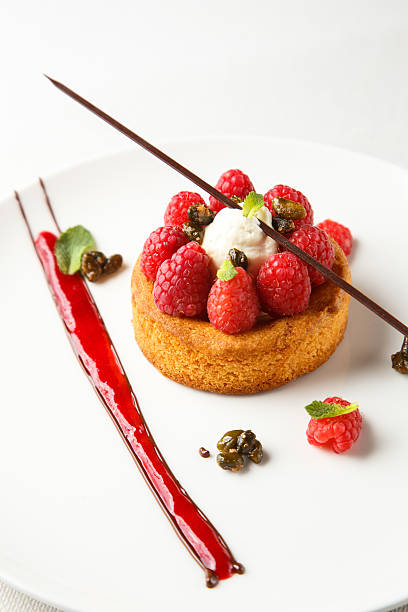 istock Sable breton or  shortbread with vanilla cream and raspberry coulis 539208208