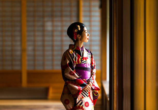 istock Japanese woman admiring views from her window 539208278
