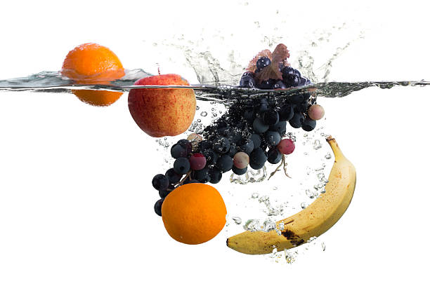 istock Fruit splashing in to water 539208361