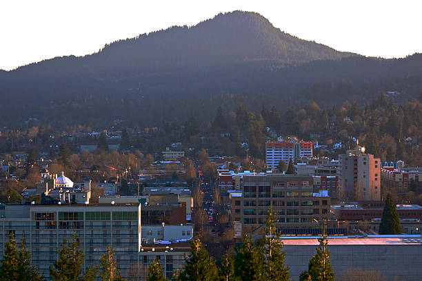 Downtown Eugene Oregon Willamette Street from Skinner Butte Evening A view of downtown Eugene, Oregon. Taken in the evening from Skinner Butte. eugene oregon stock pictures, royalty-free photos & images