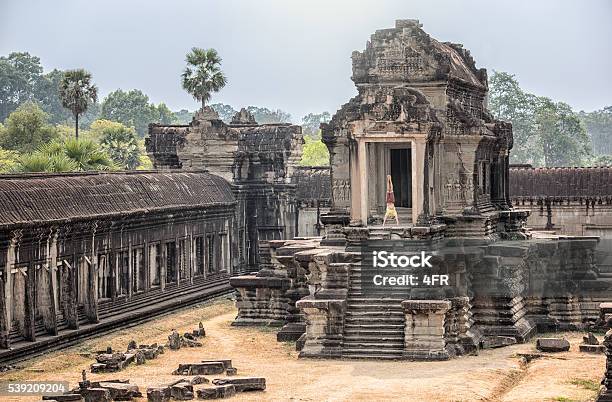 Yoga Retreat Handsome Man Doing A Handstand Angkor Wat Stock Photo - Download Image Now