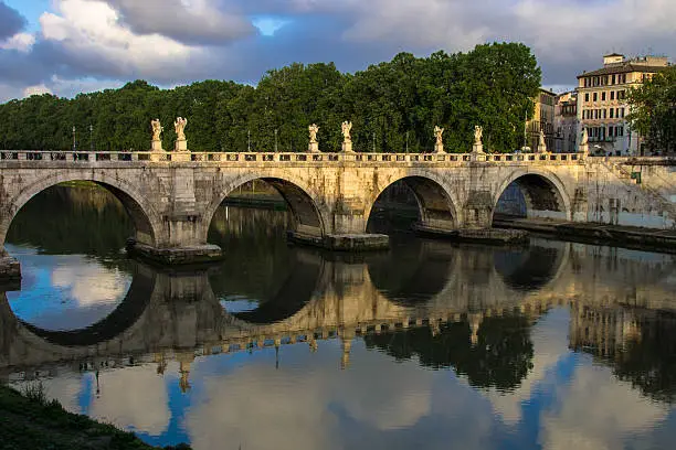 Photo of Ponte Sant'Angelo bridge reflections