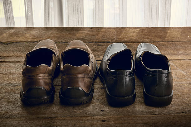 istock men's shoes on wooden background 539211170