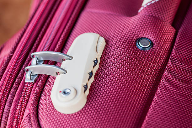 istock combination lock on red suitcase travel bag 539211394
