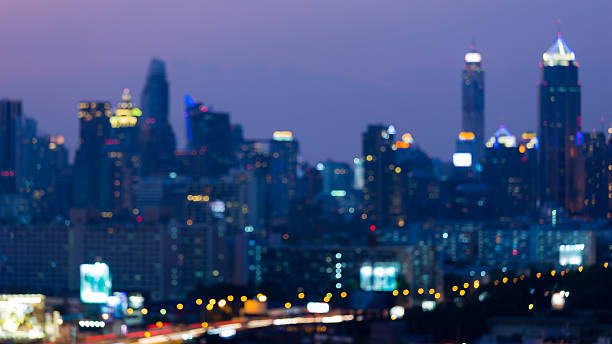 istock Blurred light night view city business downtown, abstract background 539211616