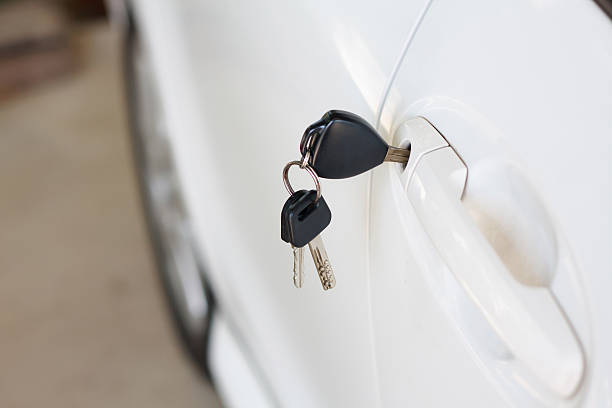 istock Car keys left in the car door 539212080
