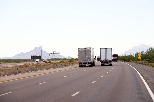 istock Arizona highway traffic with semi trucks trailers 539213146