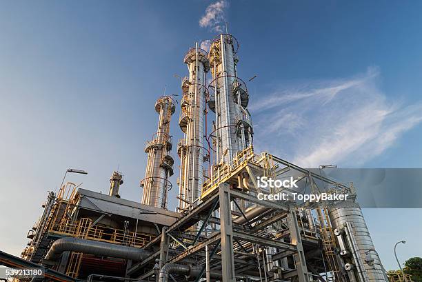 Distillation Columns And Their Process Equipments Stock Photo - Download Image Now - Hydrogen, Petrochemical Plant, Factory