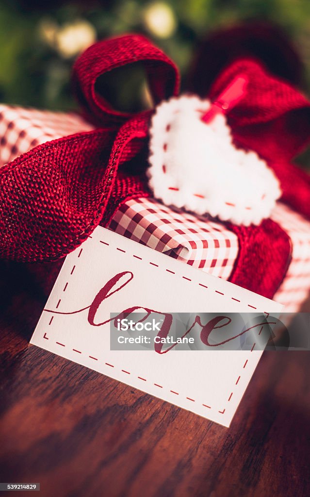 Gift Of Love With Flowers And Heart Shaped Gift Tag Stock Photo - Download  Image Now - iStock