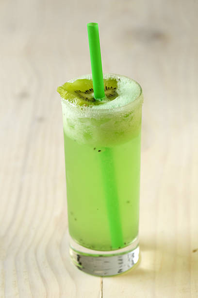 istock Fresh kiwi juice in a glass on table close-up 539214832