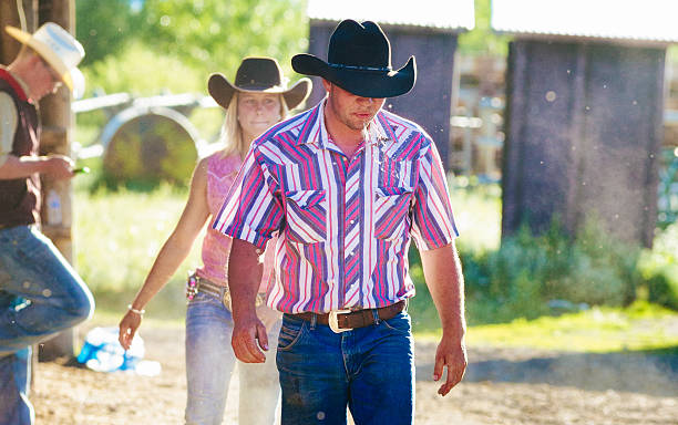 istock Spitting cowboy at the end of day on ranch 539214963