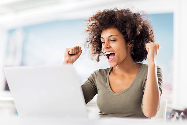 istock Cheerful African American woman using laptop. 539215231