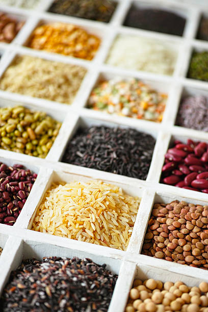 istock Various grains, beans, pulses, nuts and seeds in a tray. 539216137