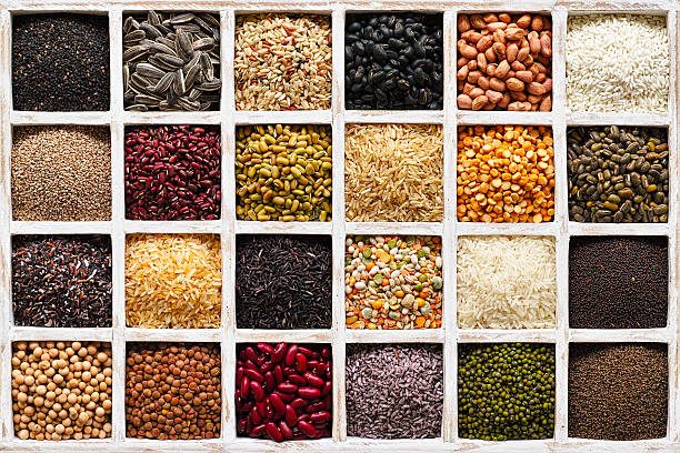 istock Various grains, beans, pulses, nuts and seeds in a tray. 539216143