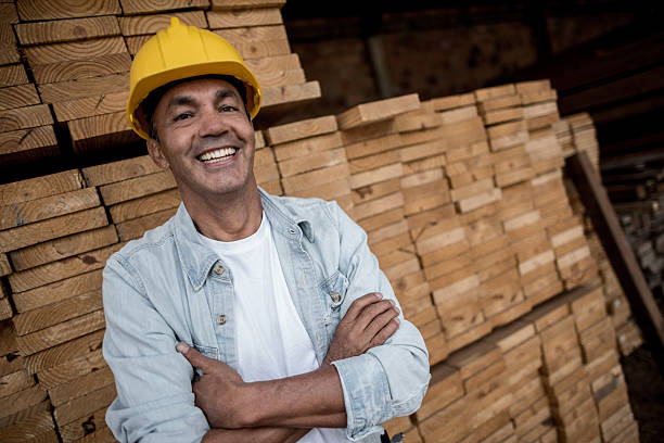 istock Carpenter with piles of wood 539216413