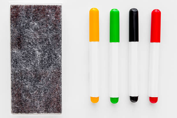 Felt Tip Pen,Eraser, on whiteboard with copy space.