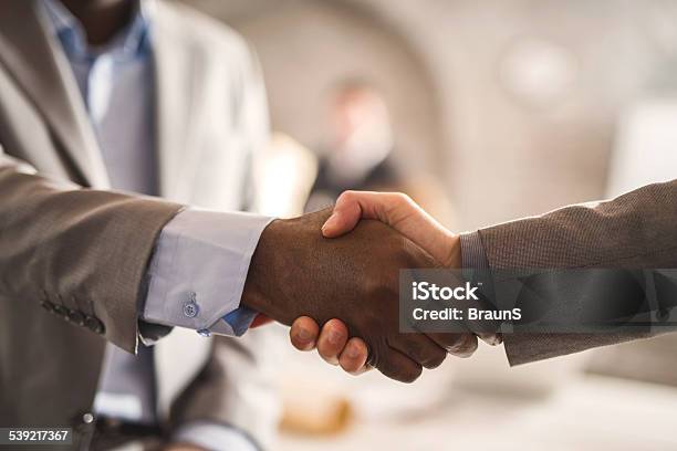 Business Handshake Stock Photo - Download Image Now - Handshake, African Ethnicity, African-American Ethnicity