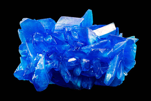 istock Chalcanthite blue stone copper sulfate crystals isolated on black 539217969