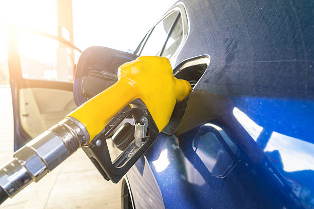 istock gas gun and car 539219328