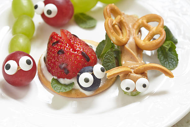 istock Funny beetles from grapes and berries 539220878