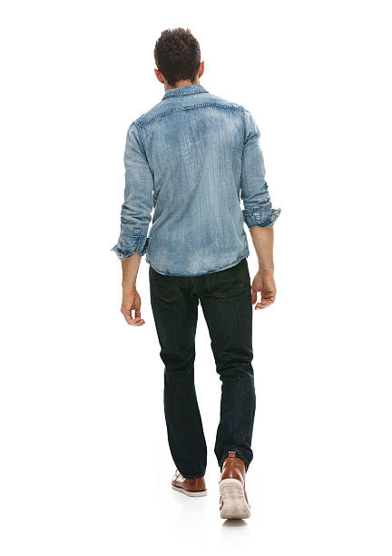 istock Rear view of casual man walking 539222806