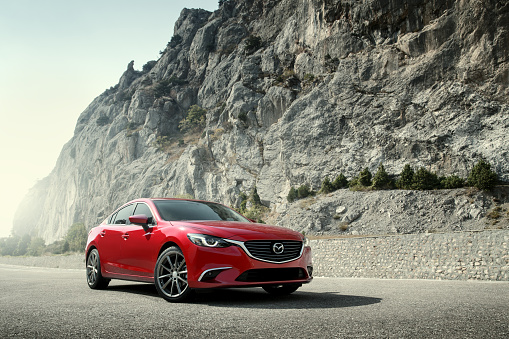 Crimea, Russia - September 20, 2015: Mazda 6 car on the road at daytime