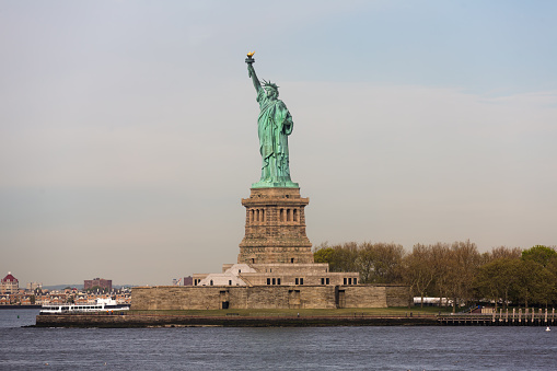 New York, USA - Apr 28, 2016: Statue of Liberty in early morning. New York City, USA
