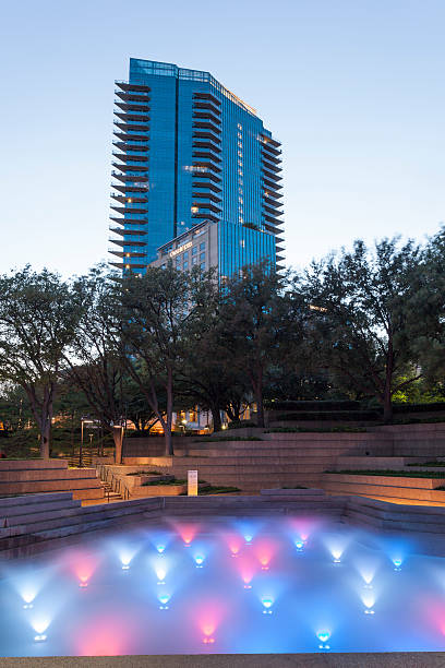 Fort Worth, TX, USA - April 6, 2016: Illuminated fountains at the Water Gardens Park in the city of Fort Worth. Texas, United States
