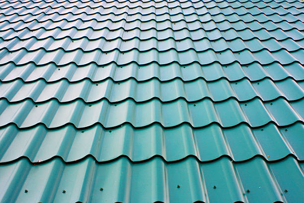 istock green tiles roof background 539226348