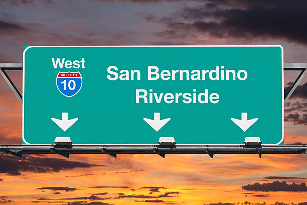istock San Bernardino Riverside Interstate 10 West Highway Sign with Sunrise 539227472
