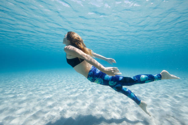 istock Young woman swimming freely 539229024