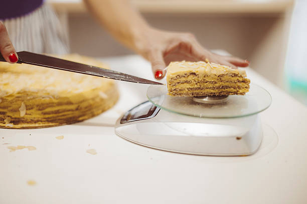 Confectioner is working in her pastry shop