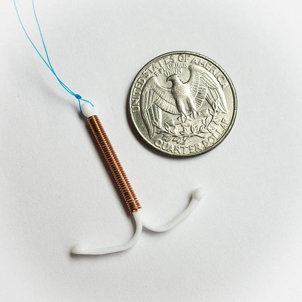 IUD Intrauterine Device (IUD) Birth Control  iud stock pictures, royalty-free photos & images